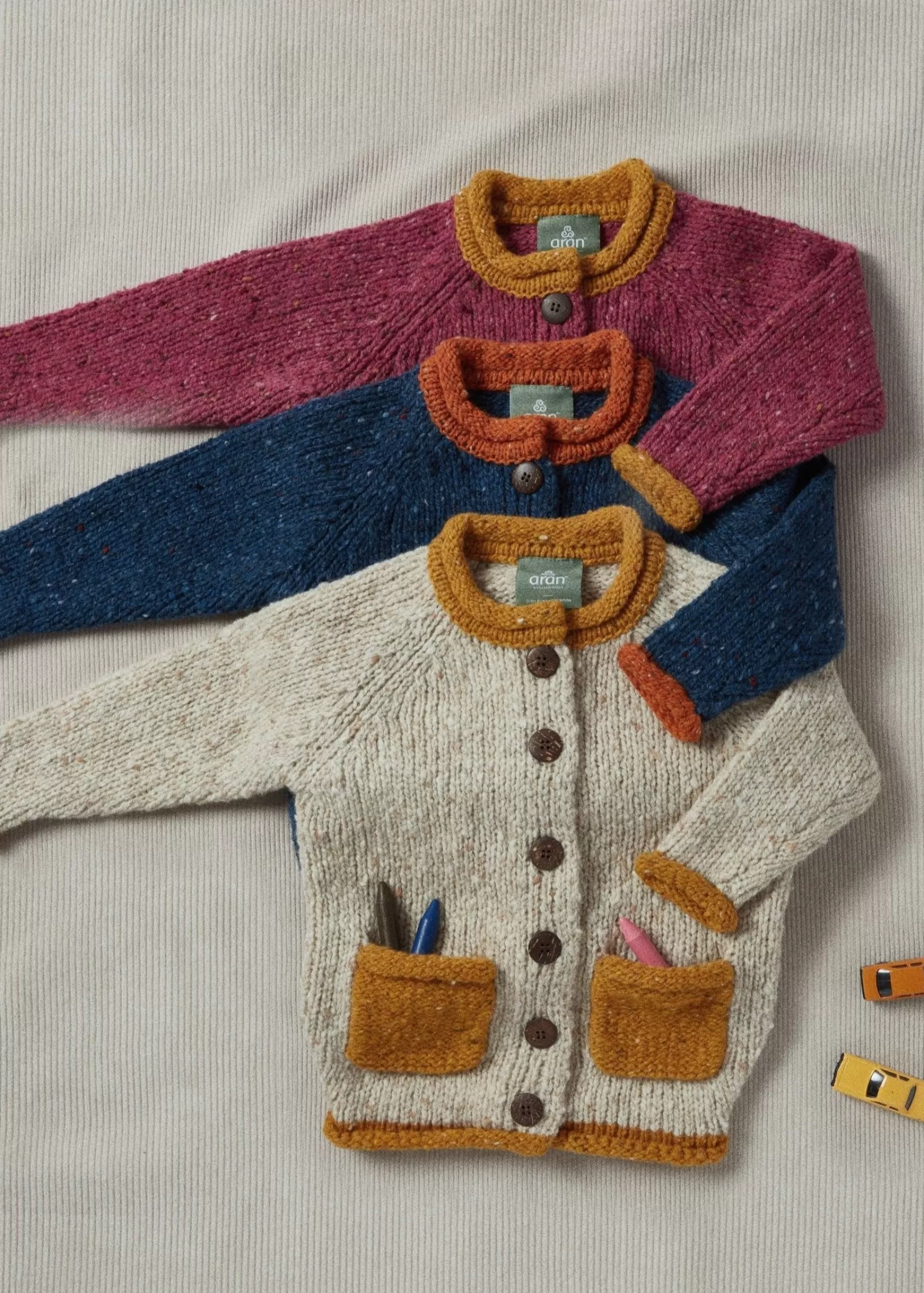 Kids^Aran Woollen Mills Childrens Roll Neck Cardigan | Donegal Wool