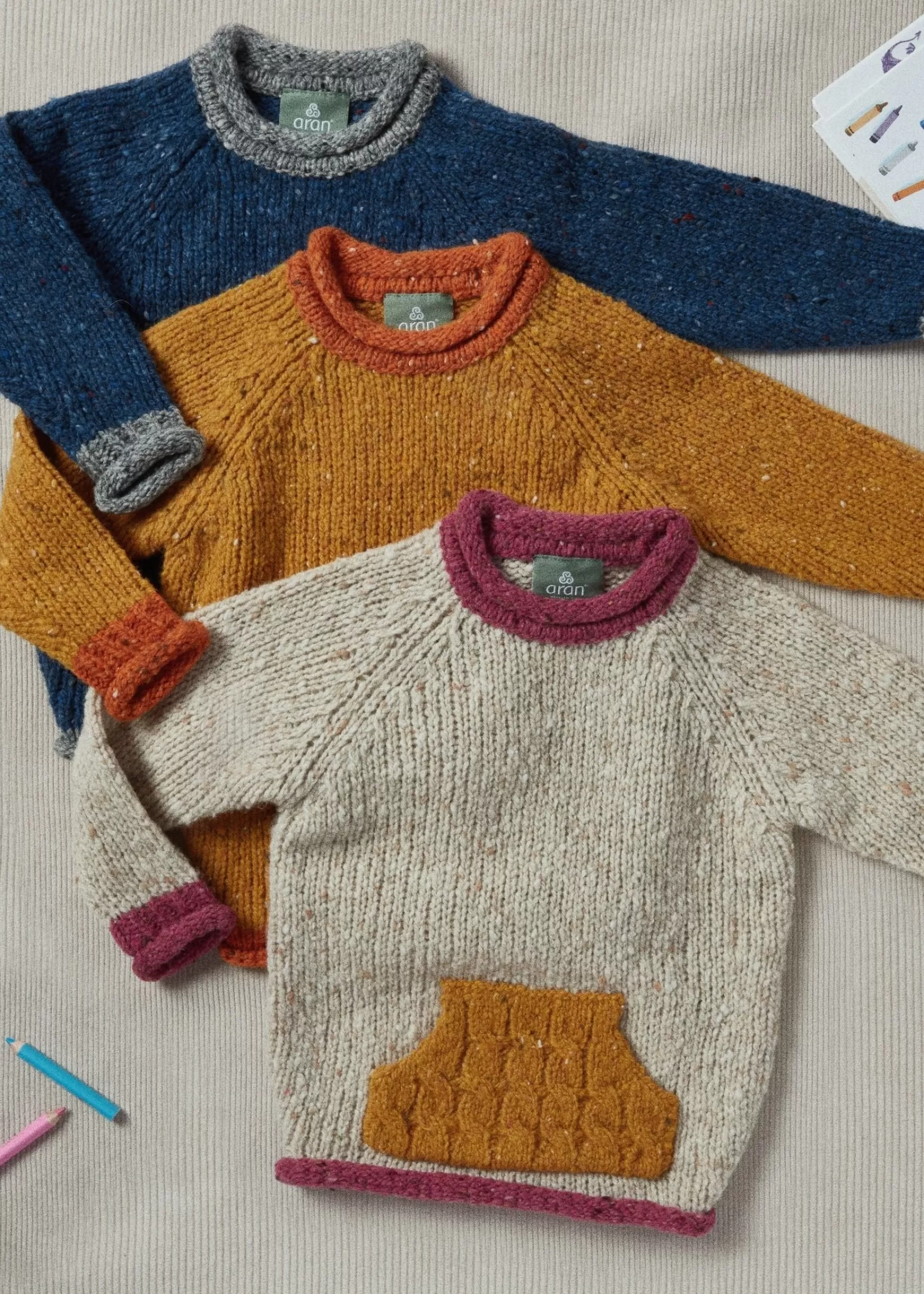 Kids^Aran Woollen Mills Childrens Roll Neck Sweater | Kangaroo Pocket